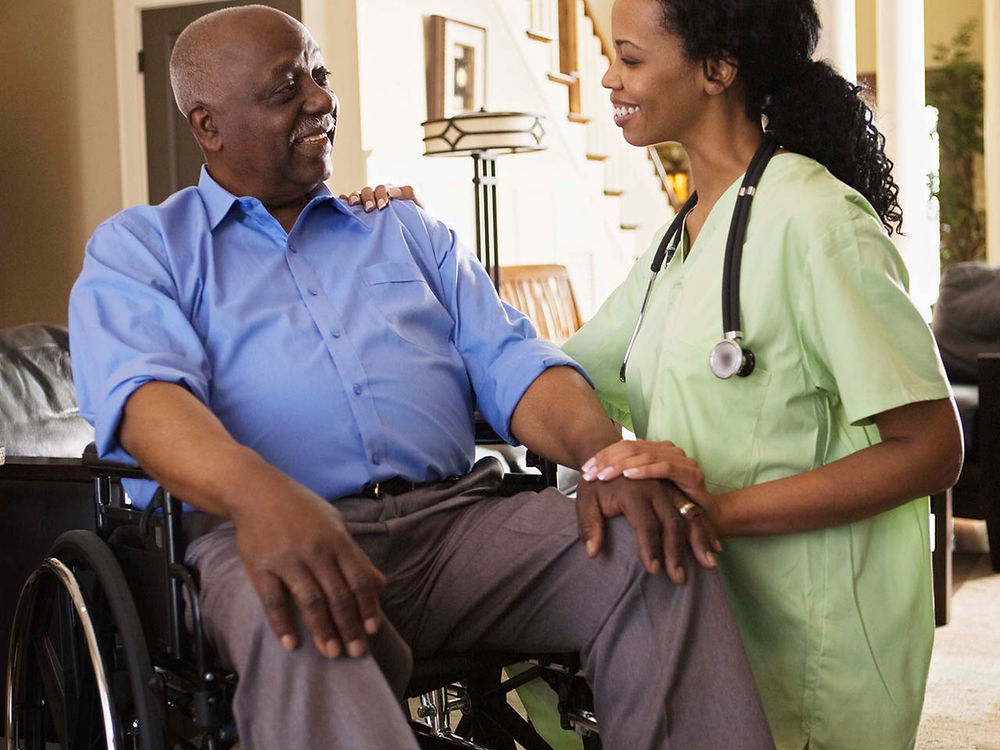 Caregiver supporting a participant