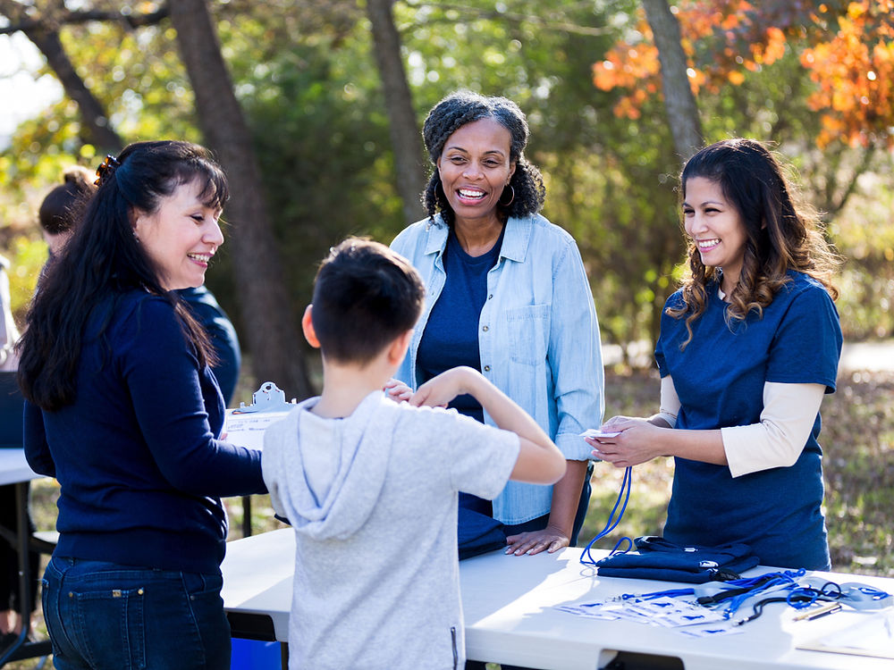 Volunteers supporting a participant